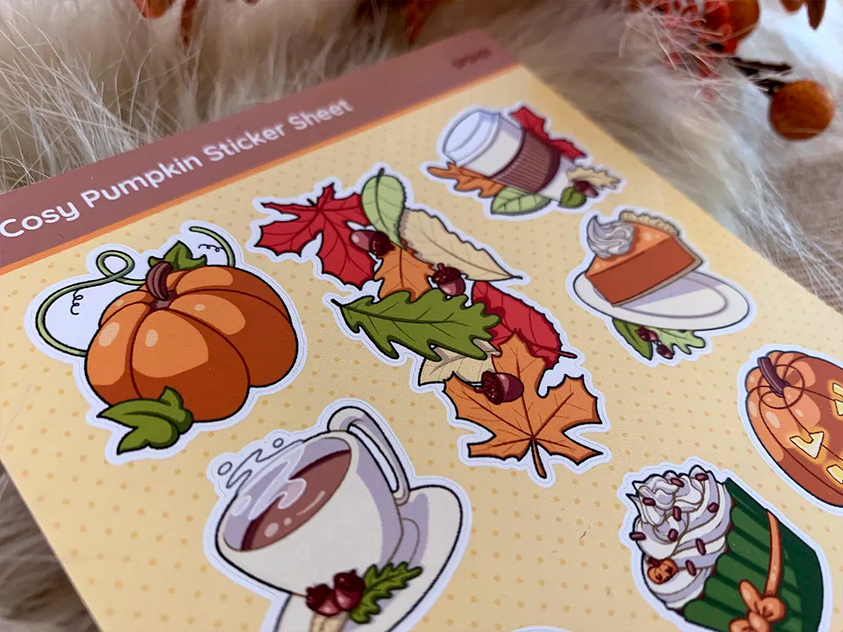 Close up of fall leaves sticker, and cosy pumpkin journal sticker