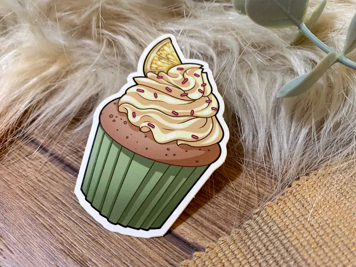 Close up of a mouth watering lemon cupcake sticker for phone cases, laptops and journals